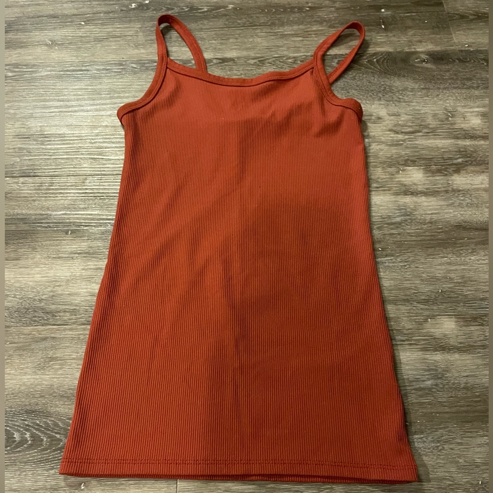 like a burnt orange color. spaghetti straps